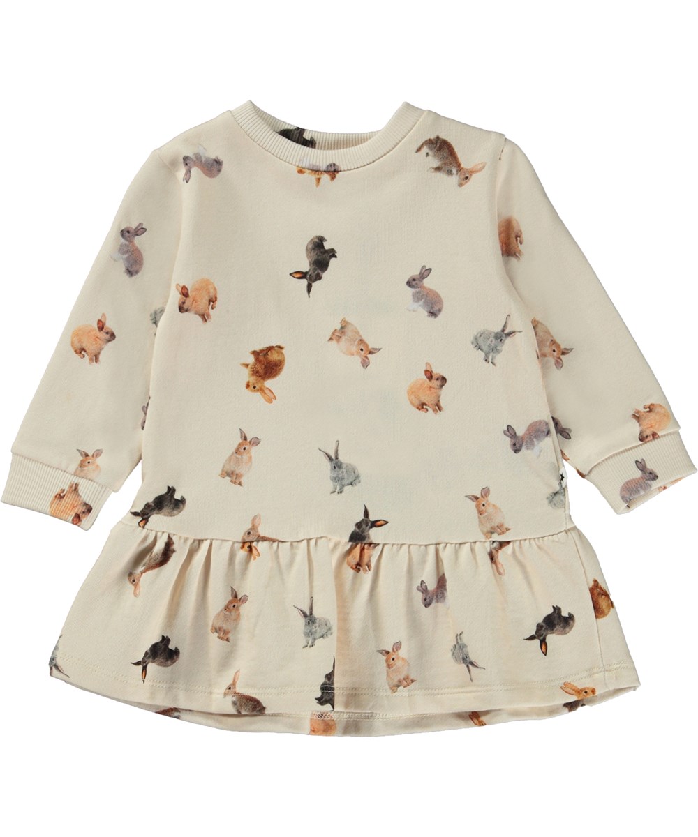 Calypso - Jumping Bunnies - Off-white baby dress with print of small bunnies