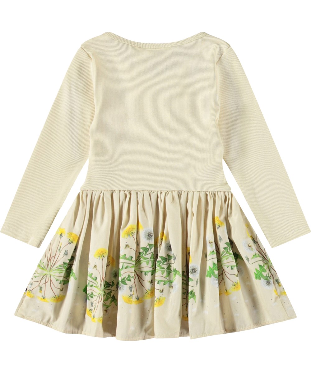 Candi - Baby Dandelion - Long-sleeved dress for baby in organic cotton. The dress is yellow with a dandelion print.