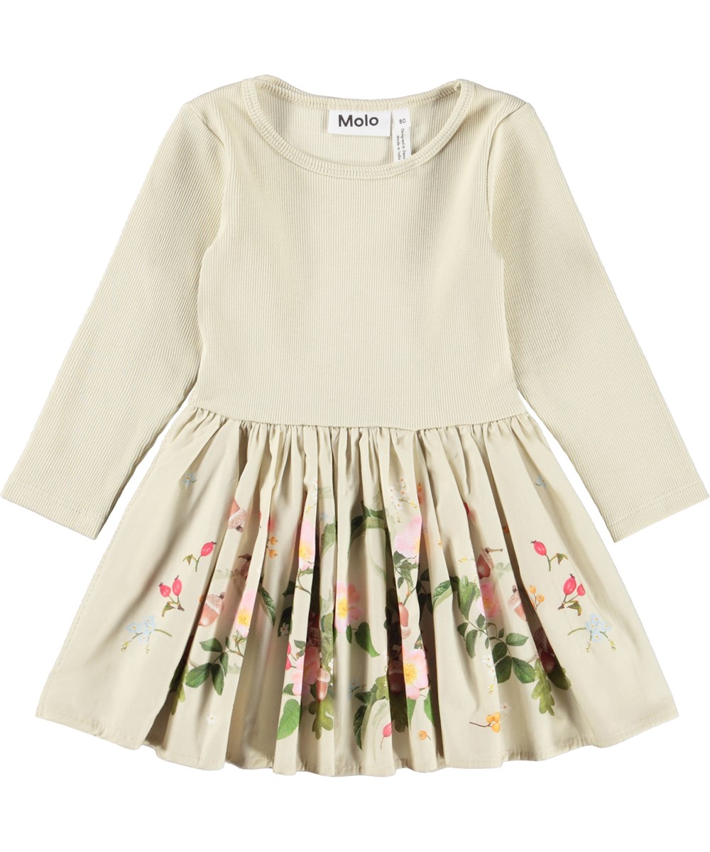 Candi - Floral Heart - Long-sleeved dress for the little ones made of organic cotton. The dress is light green with a print of flowers.