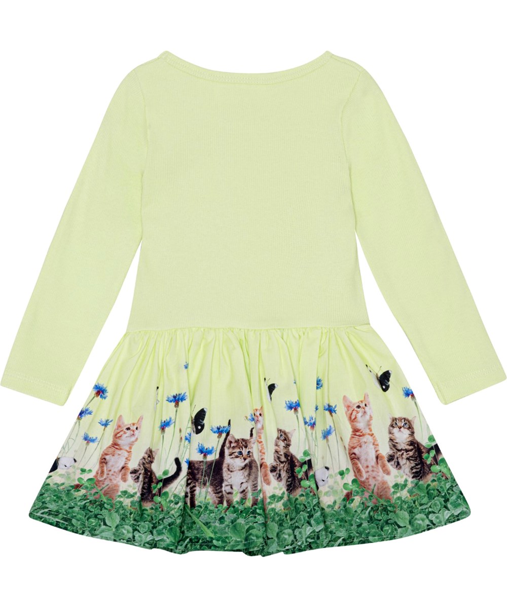 Candi - Yin Yang Kitten - Long sleeve, pastel yellow dress with a circular skirt in organic cotton 