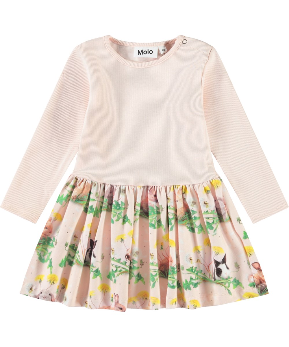 Carel - Bunnies United - Long-sleeved dress for baby in organic cotton. Pink with a print of rabbits and dandelions.