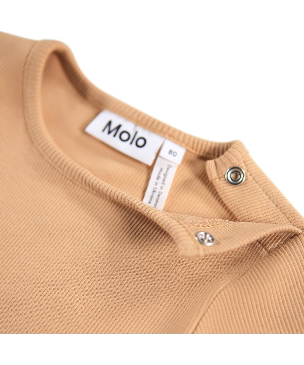 Carel - Fuzzy Fluffy - Light brown long-sleeved dress for the little ones made of organic cotton with a print of dogs and cats.