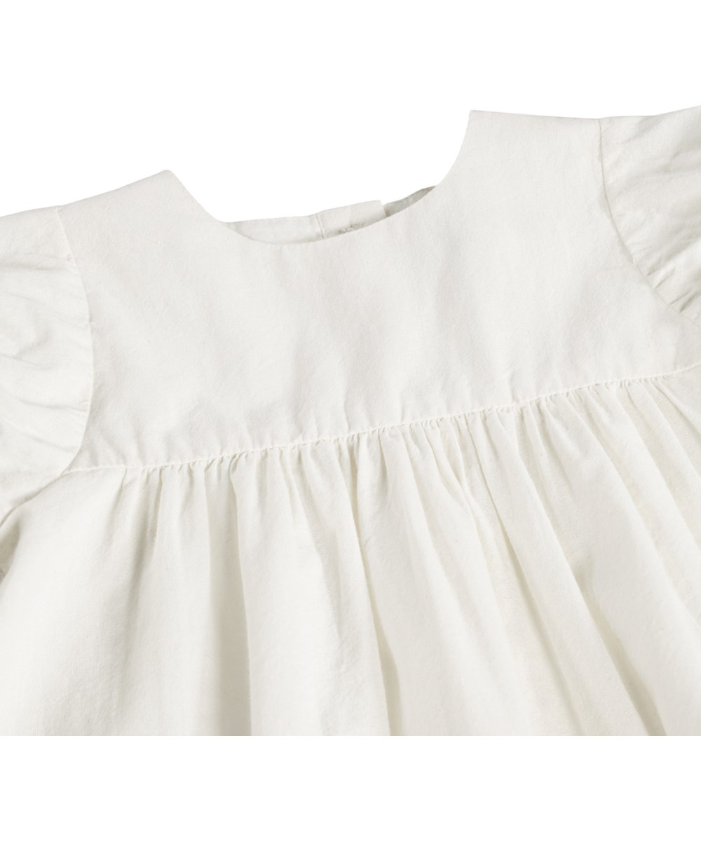 Carissa - Soft Nature - White dress for the little ones made of organic cotton with an embroidery