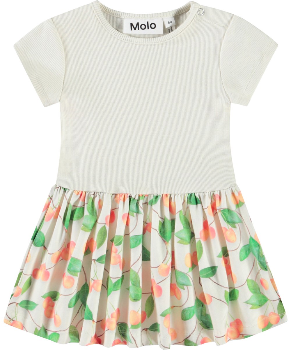 Catja - Sweet Cherries - Dress in organic cotton for baby. The dress is white with a cherry print.