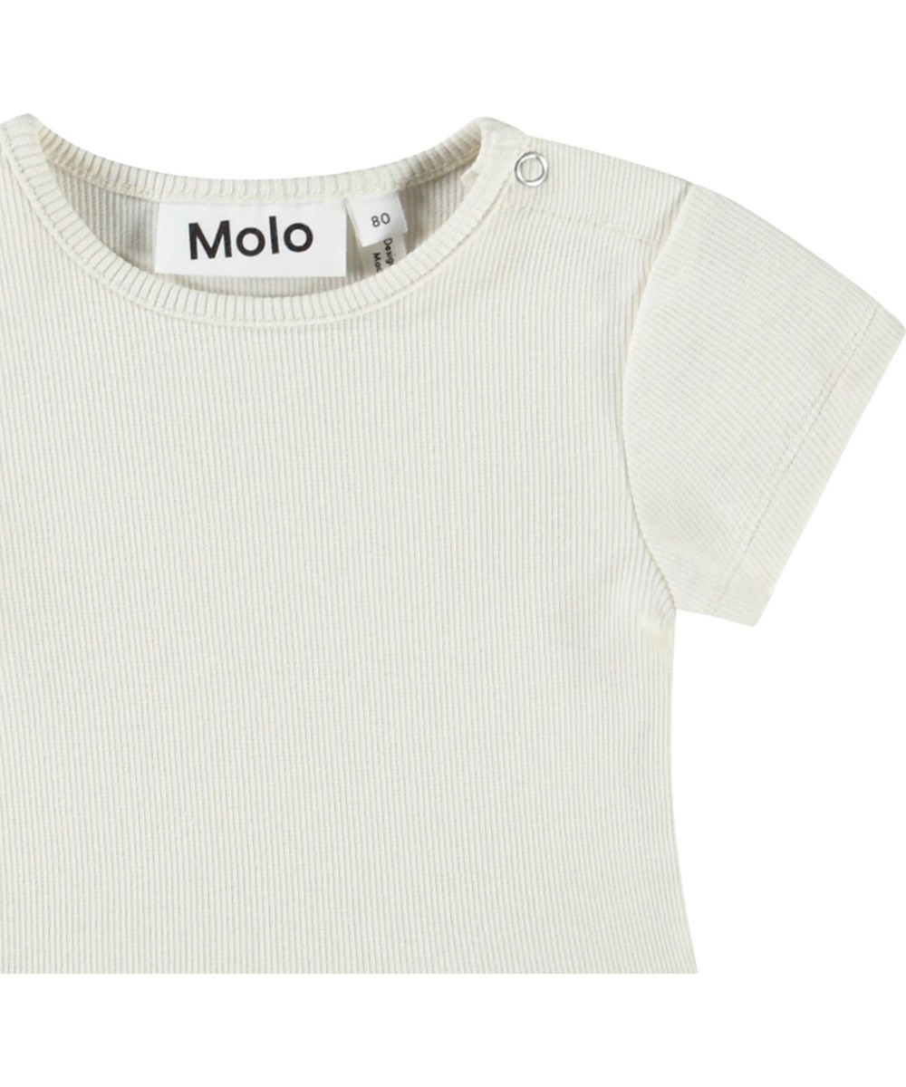 Catja - Sweet Cherries - Dress in organic cotton for baby. The dress is white with a cherry print.