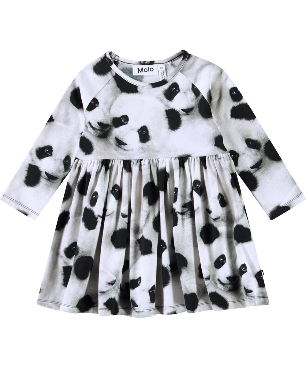 Charmaine - Giant Panda - Long-sleeved dress for baby in organic cotton. The dress features a print of panda faces.