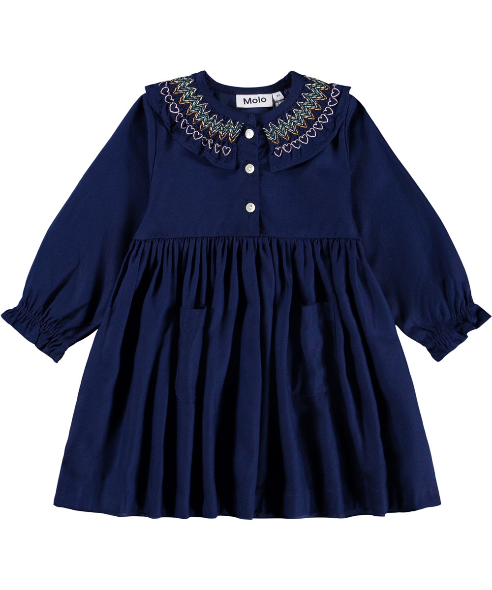 Cindie - Galaxy Blue - Long-sleeved dark blue dress for the little ones made of viscose with colorful smock details.