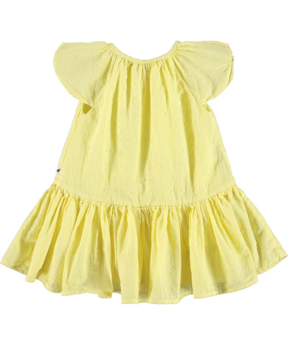 Cindie - Yellow Pear - Light yellow ruffle dress mother of pearl buttons