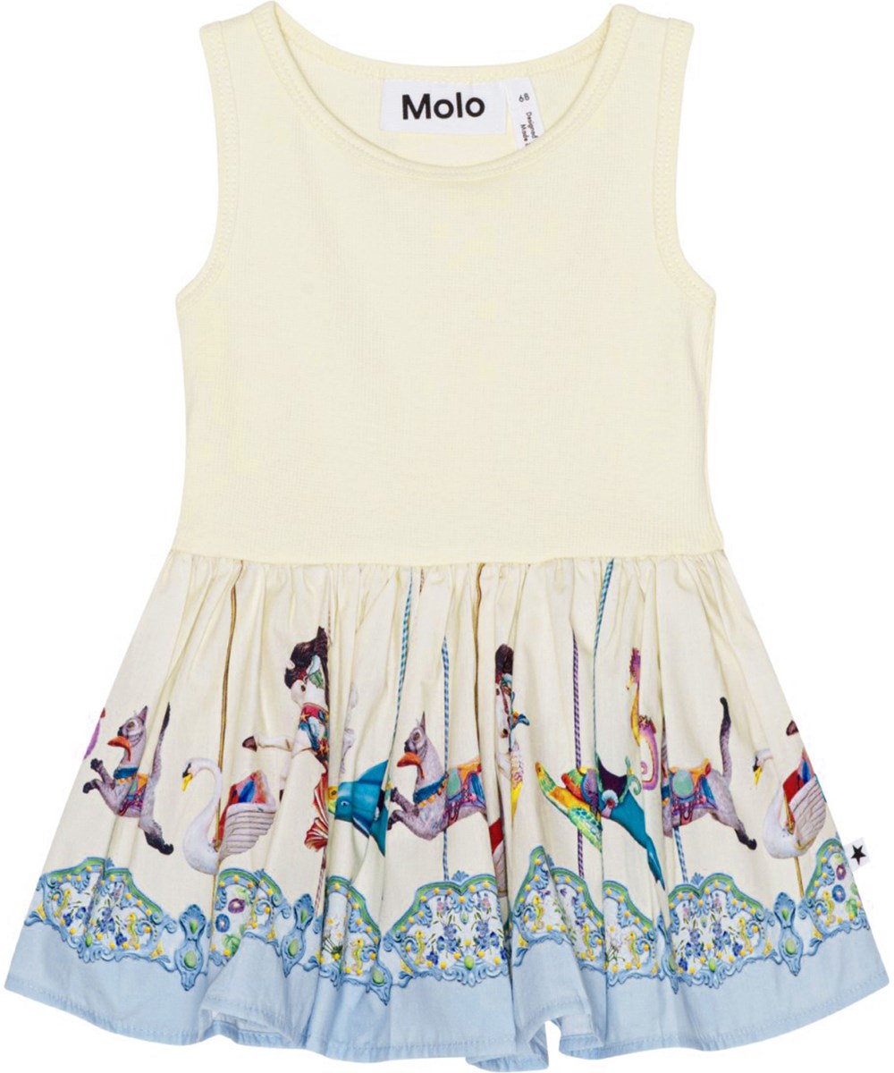Cordelia - Sea Carousel - Cream coloured, organic baby dress with carrousel print