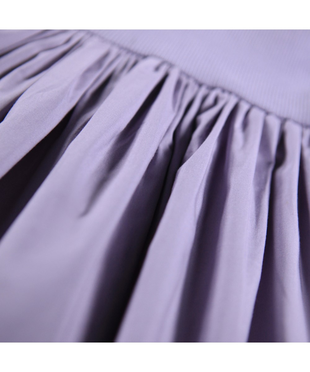 Crystala - Faded Purple - Light purple poplin dress for the little ones made of organic cotton. The top is in rib jersey and the collar and skirt in poplin.