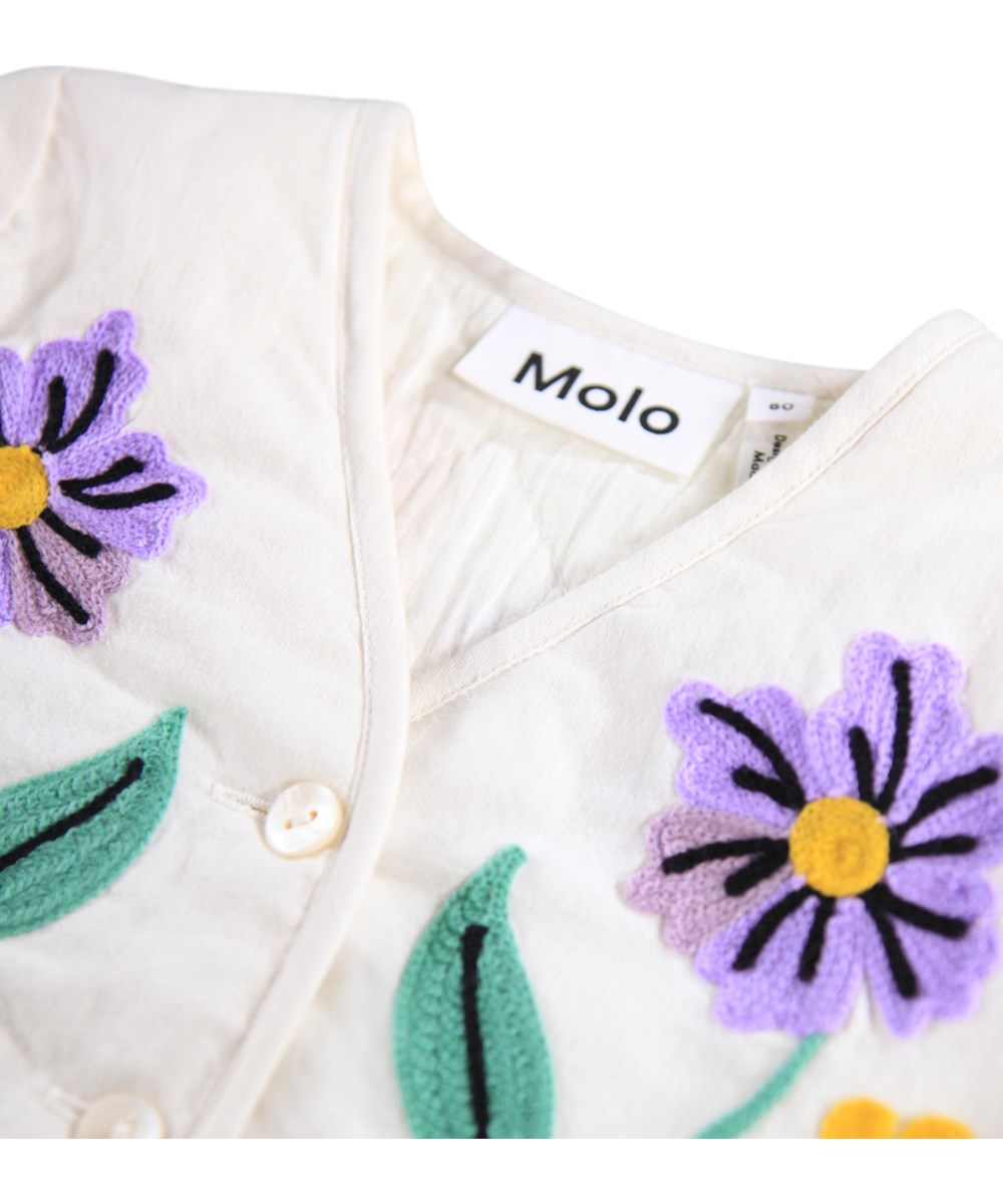 Happy - Meadow Flowers - White jacket for the little ones made of cotton with an embroidery.