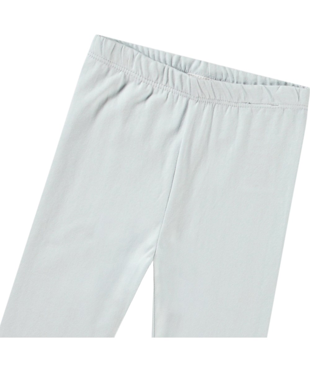 Nette Solid - Skywriting - Light blue baby leggings in organic cotton.