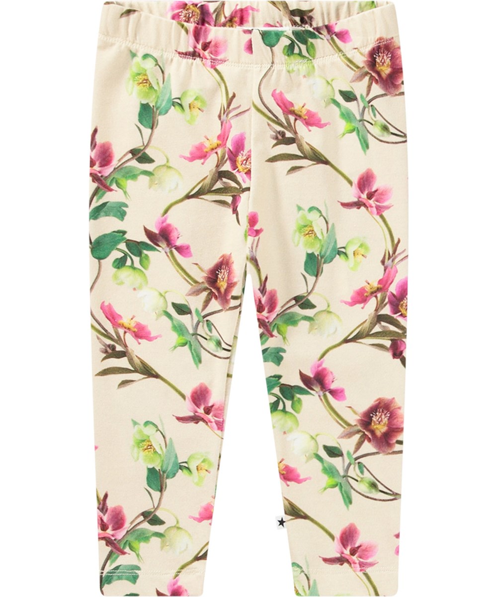 Stefanie - Hellebore - Off-white organic leggings with an all-over flower print.