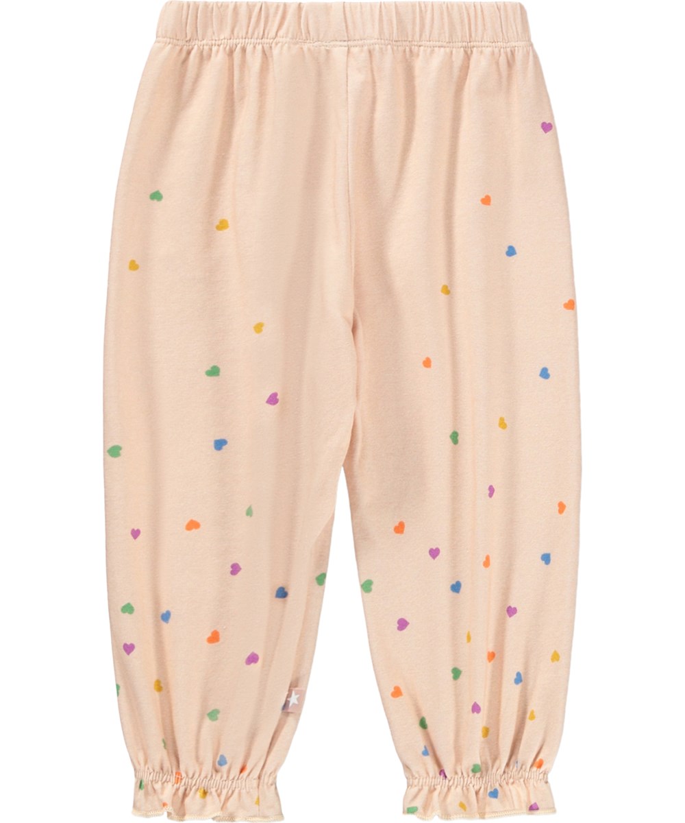 Selena - Confetti - Pink trousers for the little ones made of organic cotton with a heart print 