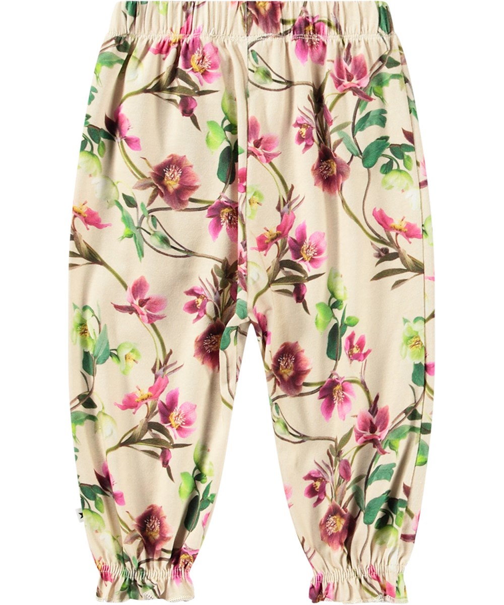 Selena - Hellebore - Off-white jersey trousers in organic cotton with flower print.