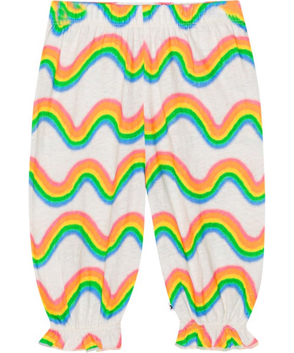 Selena - Rainbow Mini - Off-white jersey trousers for small children in organic melange cotton with a multi-coloured, all over print of Molo's iconic rainbow 