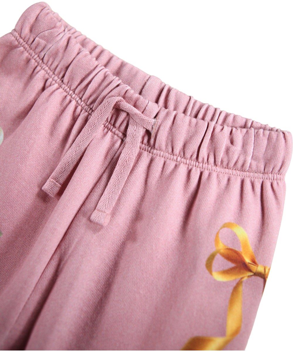 Simeon - Ribbon Play - Soft dark pink pants for the little ones made of organic cotton with a print of colorful ribbons and bows.