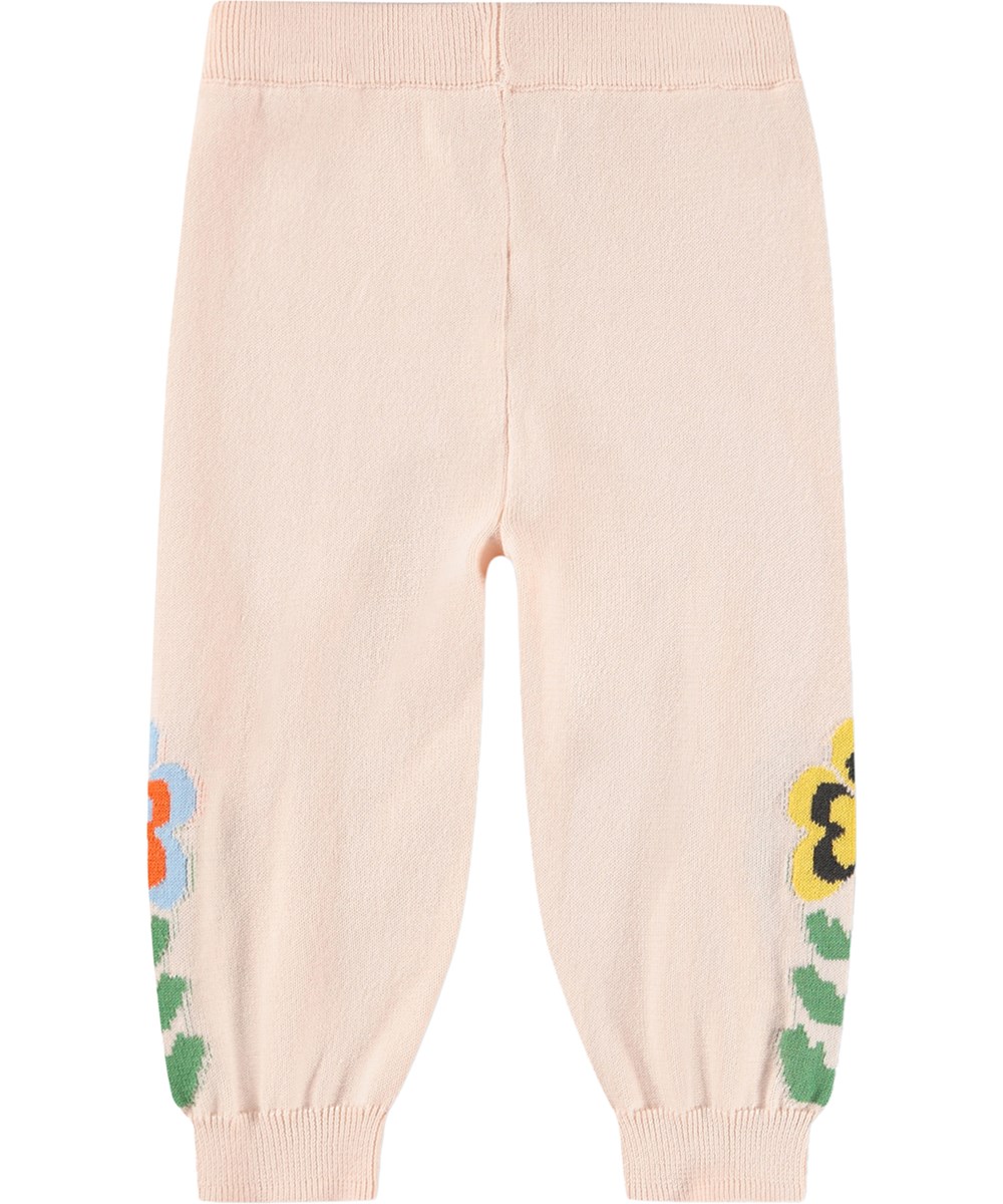 Sol - Folklore Garden - Pink knitted trousers for the little ones made of organic cotton with flowers 
