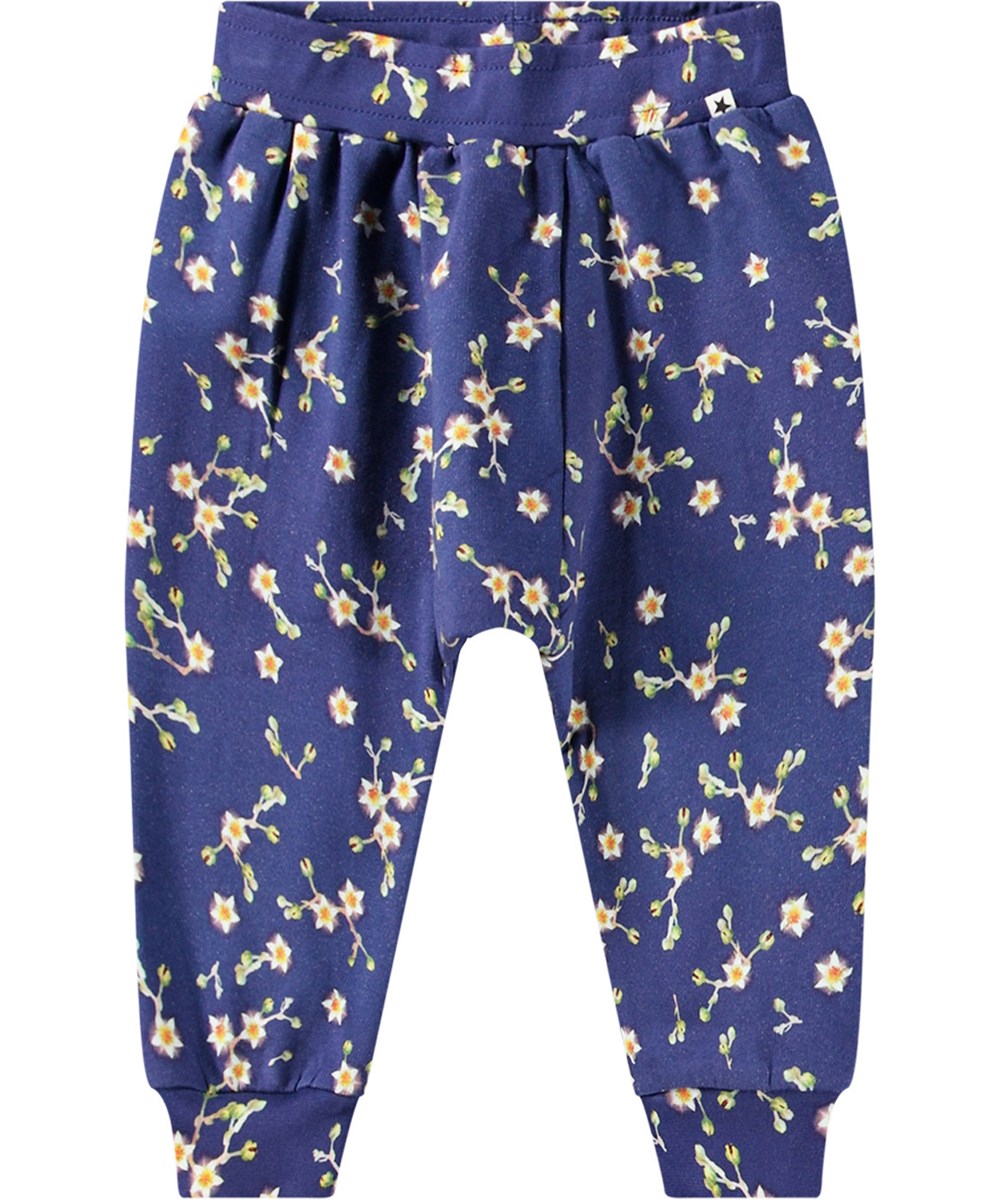 Sona - Sky Flowers - Dark blue trousers with all-over starry flower print in soft organic cotton jersey.