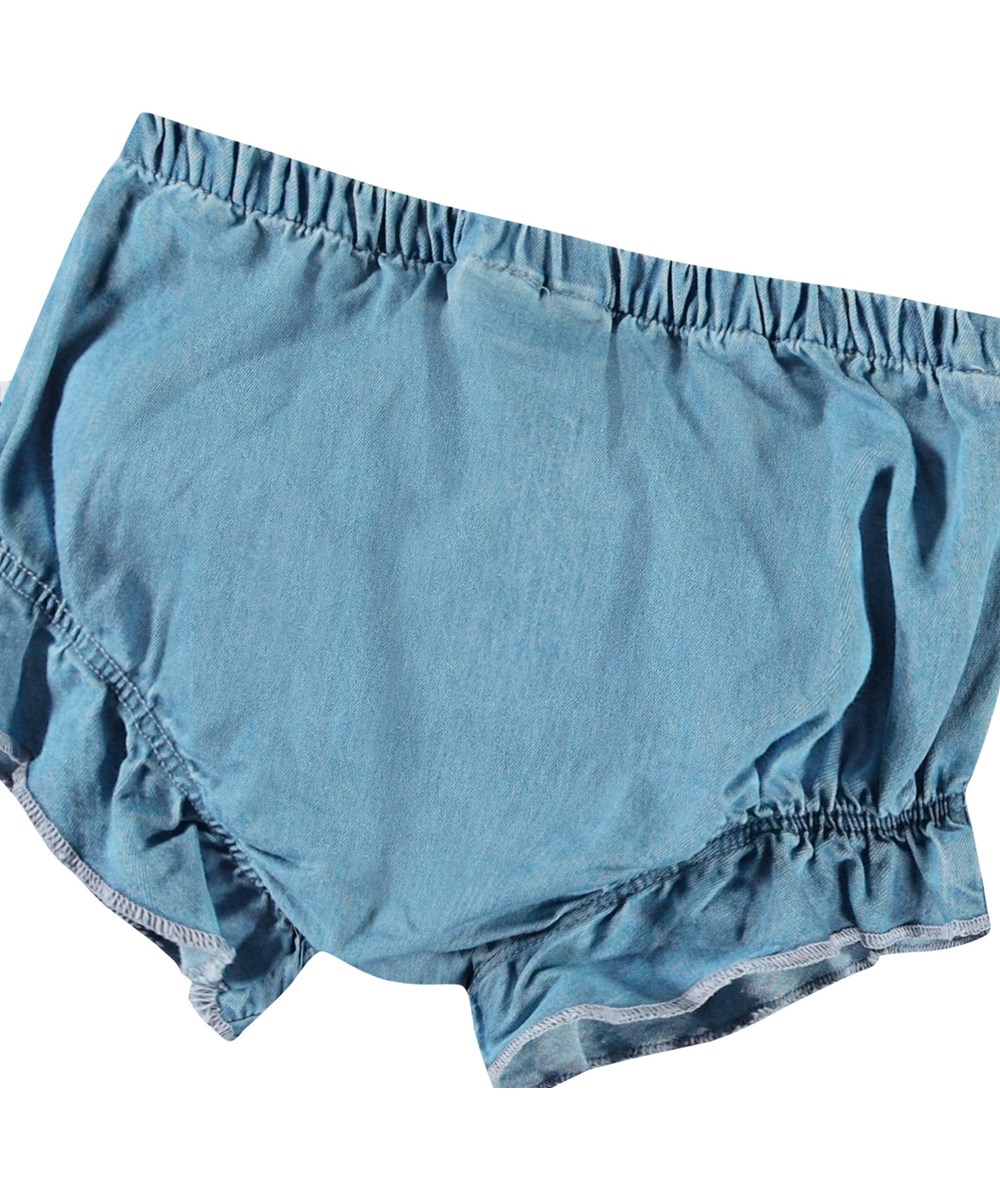Sadie - Sky Indigo - Light blue bloomer shorts in organic cotton chambray for baby.