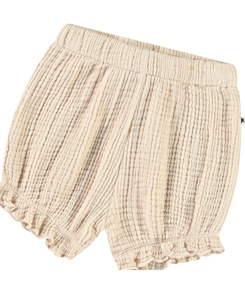 Safira - Brazilian Sand - Sandy coloured bloomer shorts in crinkled organic cotton for baby.