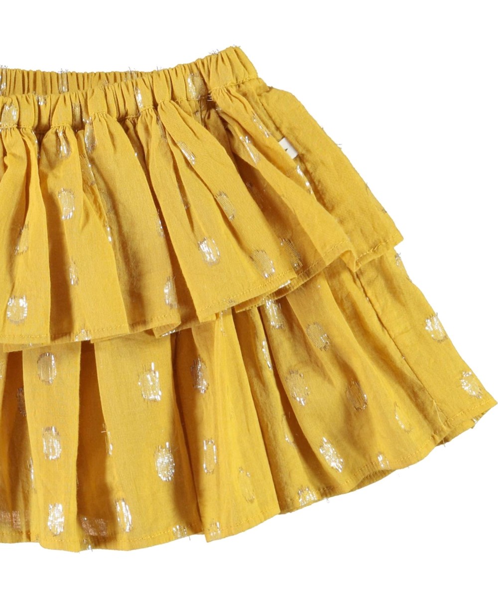 Bianca - Nugget Gold - Baby skirt in yellow with gold dots