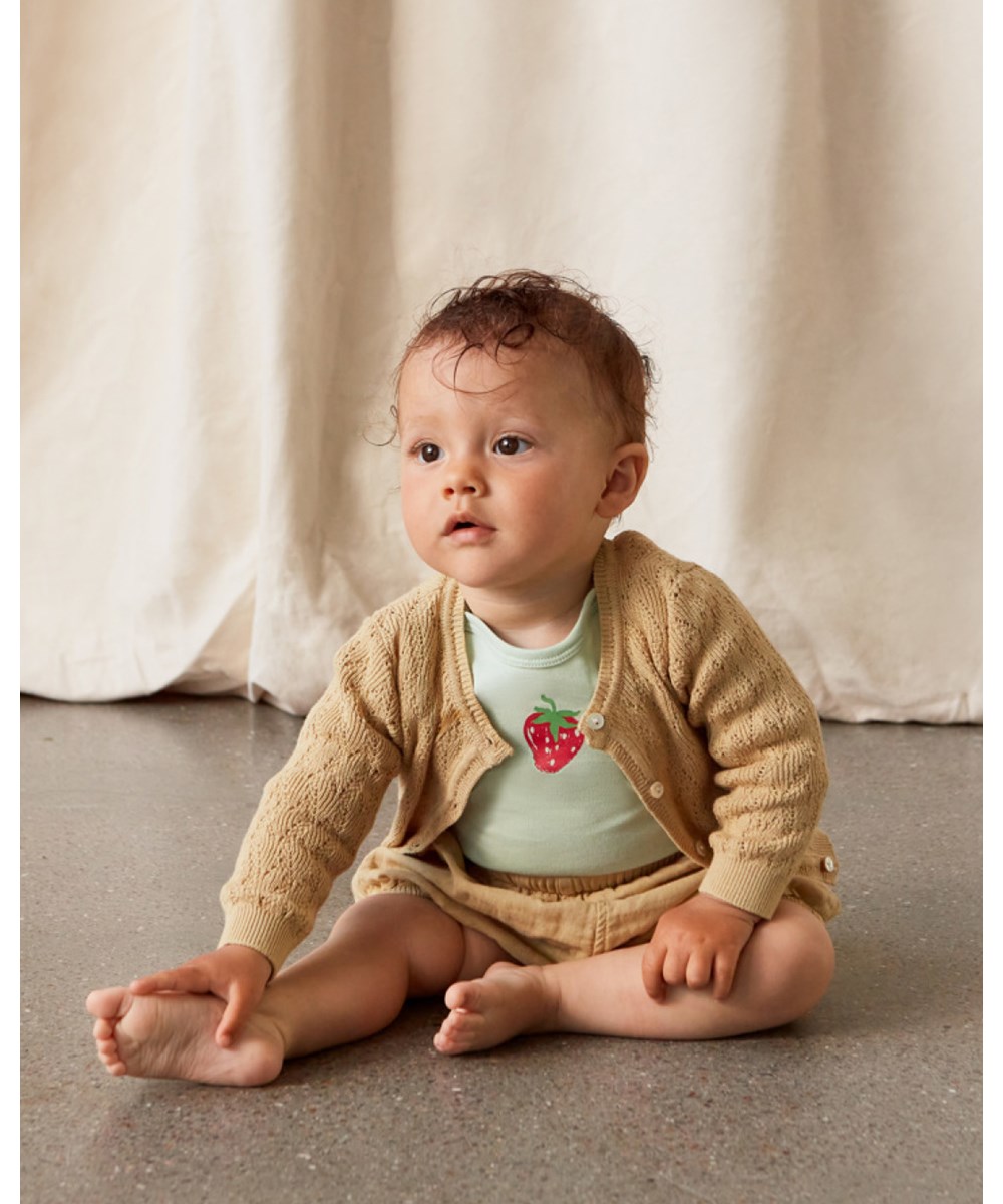 Gilli - Cardboard - Warm beige knit baby cardigan with pattern