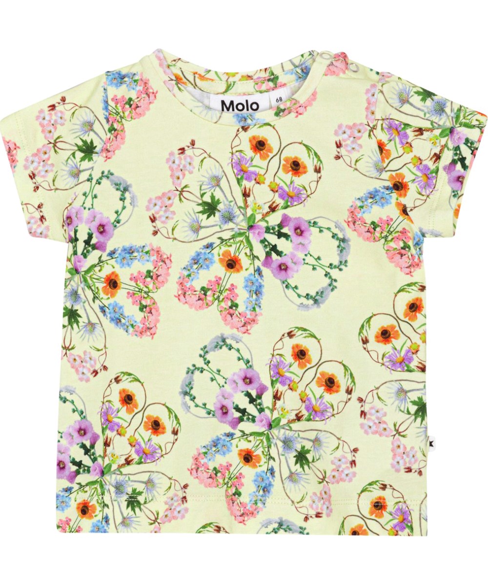 Elly - Flower Love - Yellow t-shirt in soft, organic cotton with all over print of flowers that create a beautiful silouette of clovers 