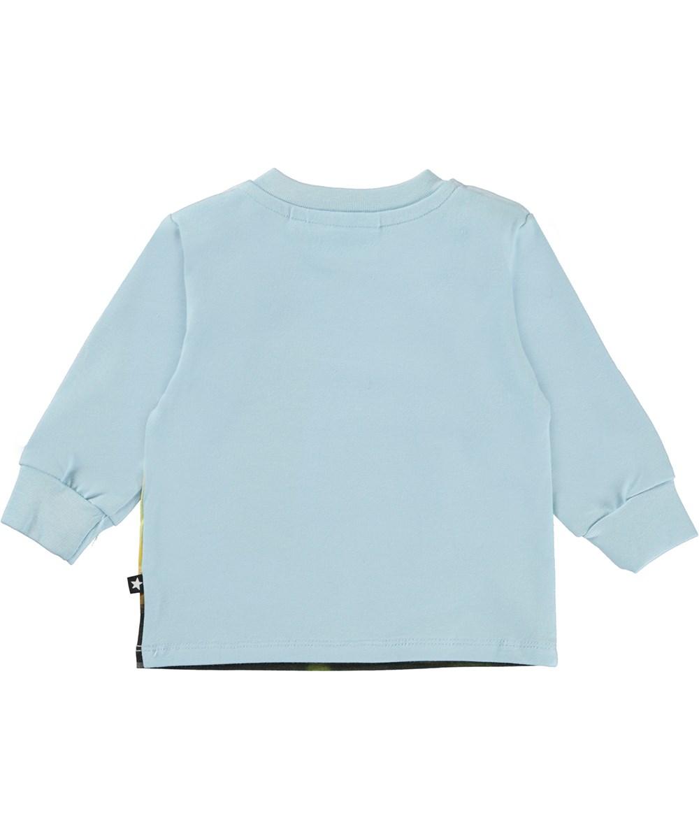 Eloy - Flying - Lichtblauwe biologische babyshirt met vliegtuig