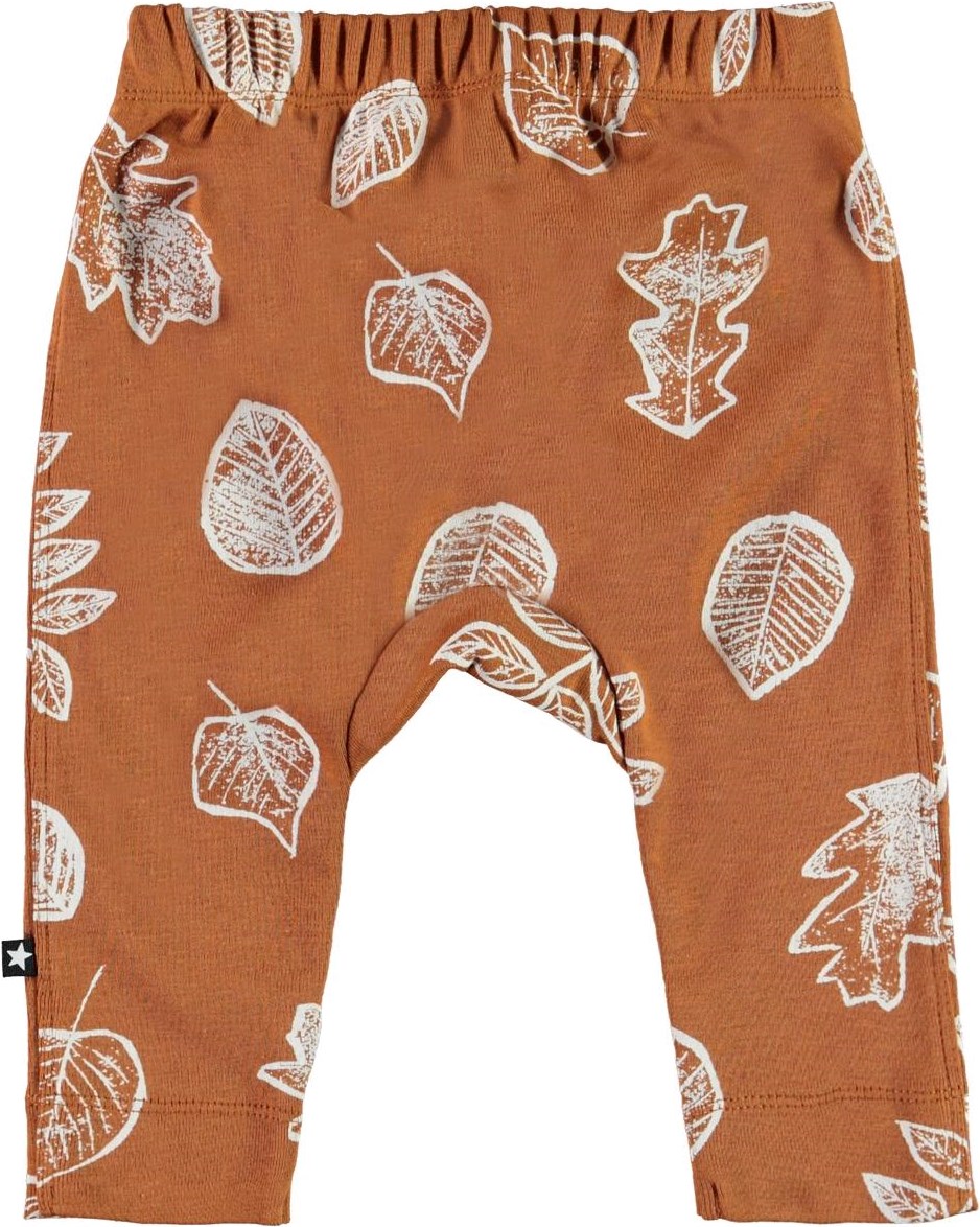 Seb - Leaves - Öko braune Babyhose mit weißen Blättern