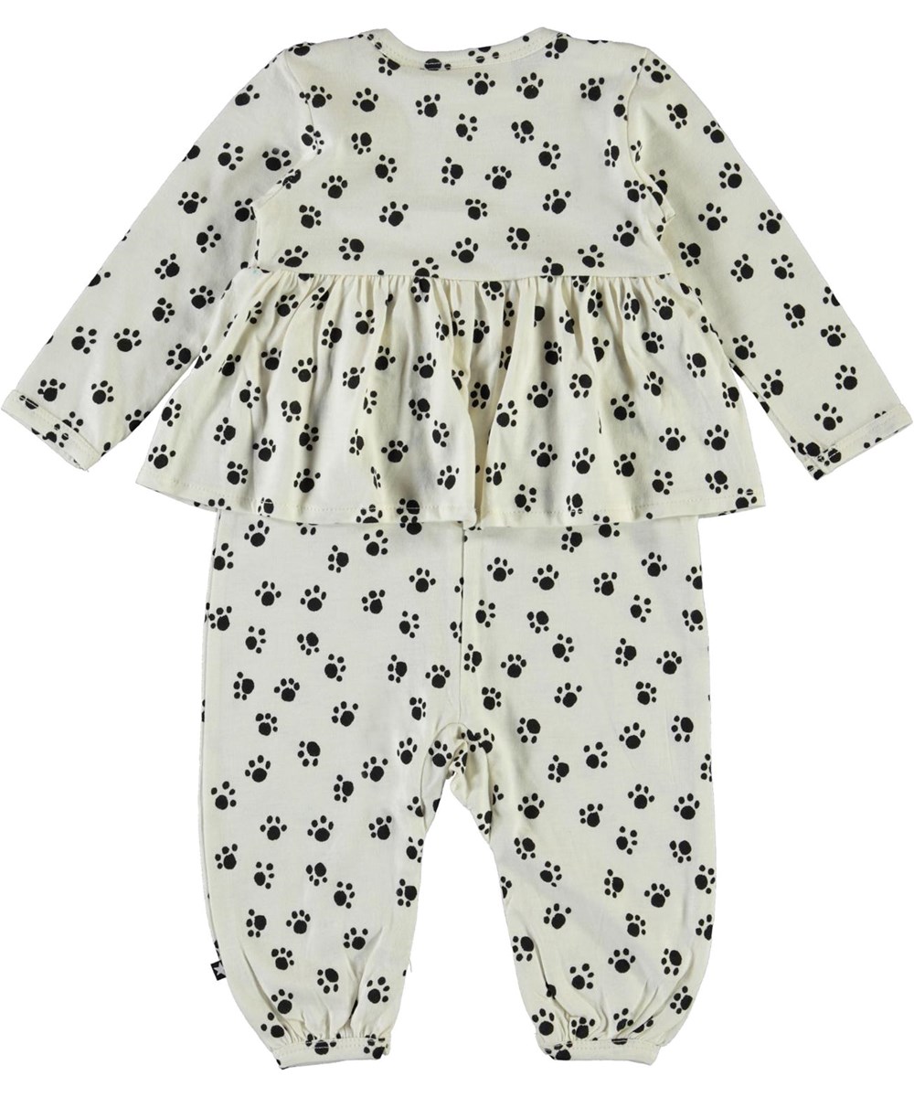 Flavia - Puppy Paws - Weißer Baby-Anzug mit Pfoten und Rüschen