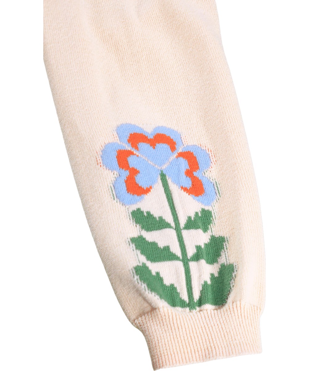 Sol - Folklore Garden - Rosa gestrickte Hosen für die Kleinen aus Bio-Baumwolle mit Blumen