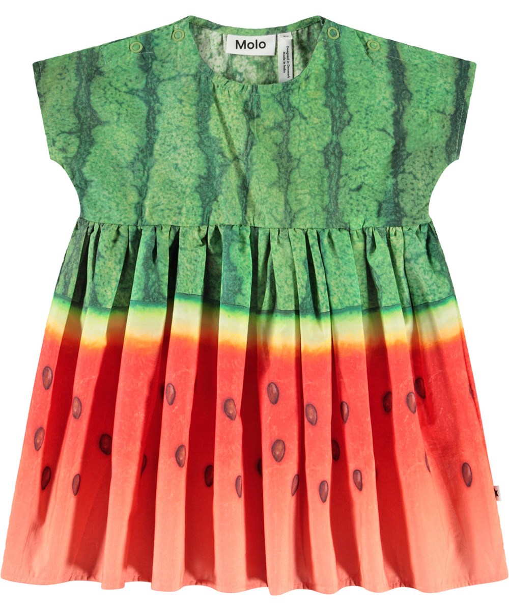 Channi - Melancia - Popelinekleid mit gutem Volumen aus Öko-Baumwolle für Babys. Das Kleid ist mit einem Wassermelonenmuster versehen.