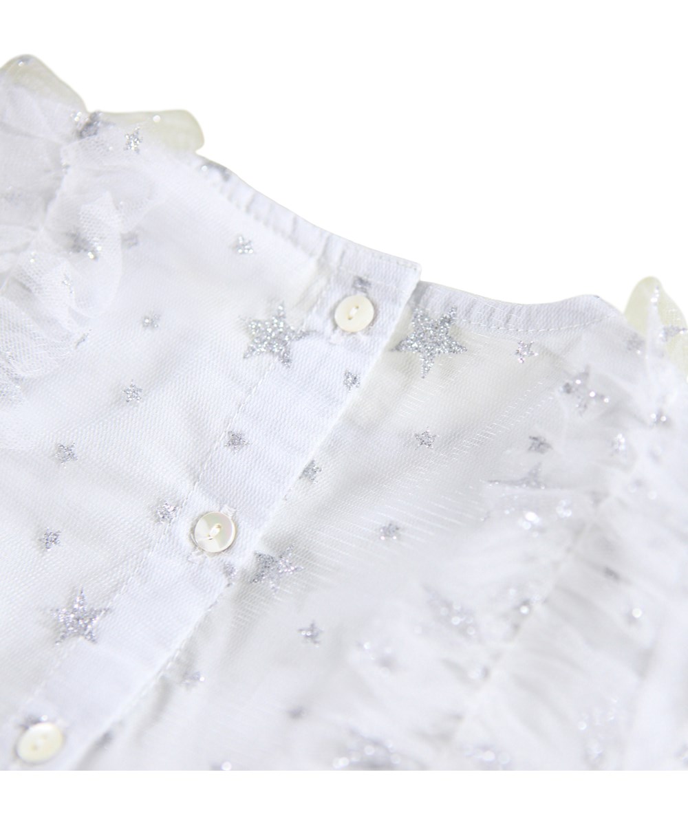 Claudette - Stardust - Festliches Kleid für die Kleinen aus feinem weißen Tüll mit silberglänzenden Sternen.