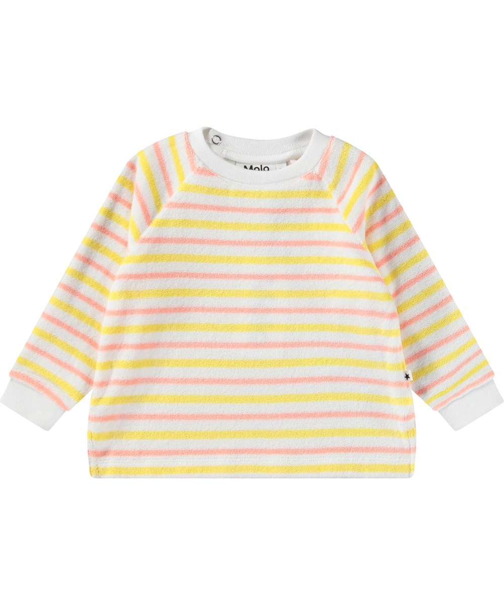 Dora - Sun Melon Stripe - Langärmeliges Oberteil aus weichem Baumwoll-Frottee für Babys mit gelben, weißen und pfirsichfarbenen Streifen.