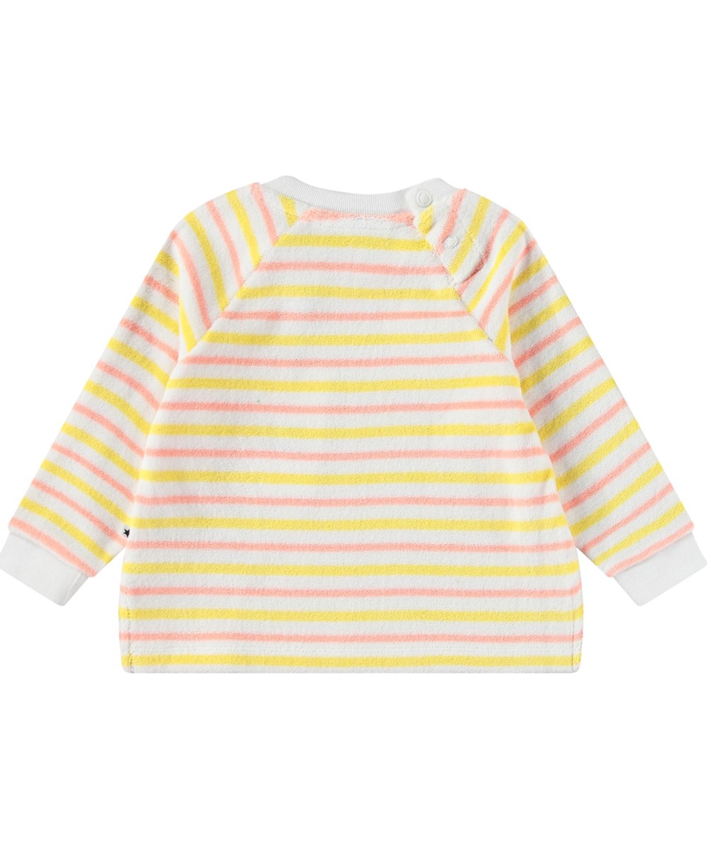 Dora - Sun Melon Stripe - Langärmeliges Oberteil aus weichem Baumwoll-Frottee für Babys mit gelben, weißen und pfirsichfarbenen Streifen.