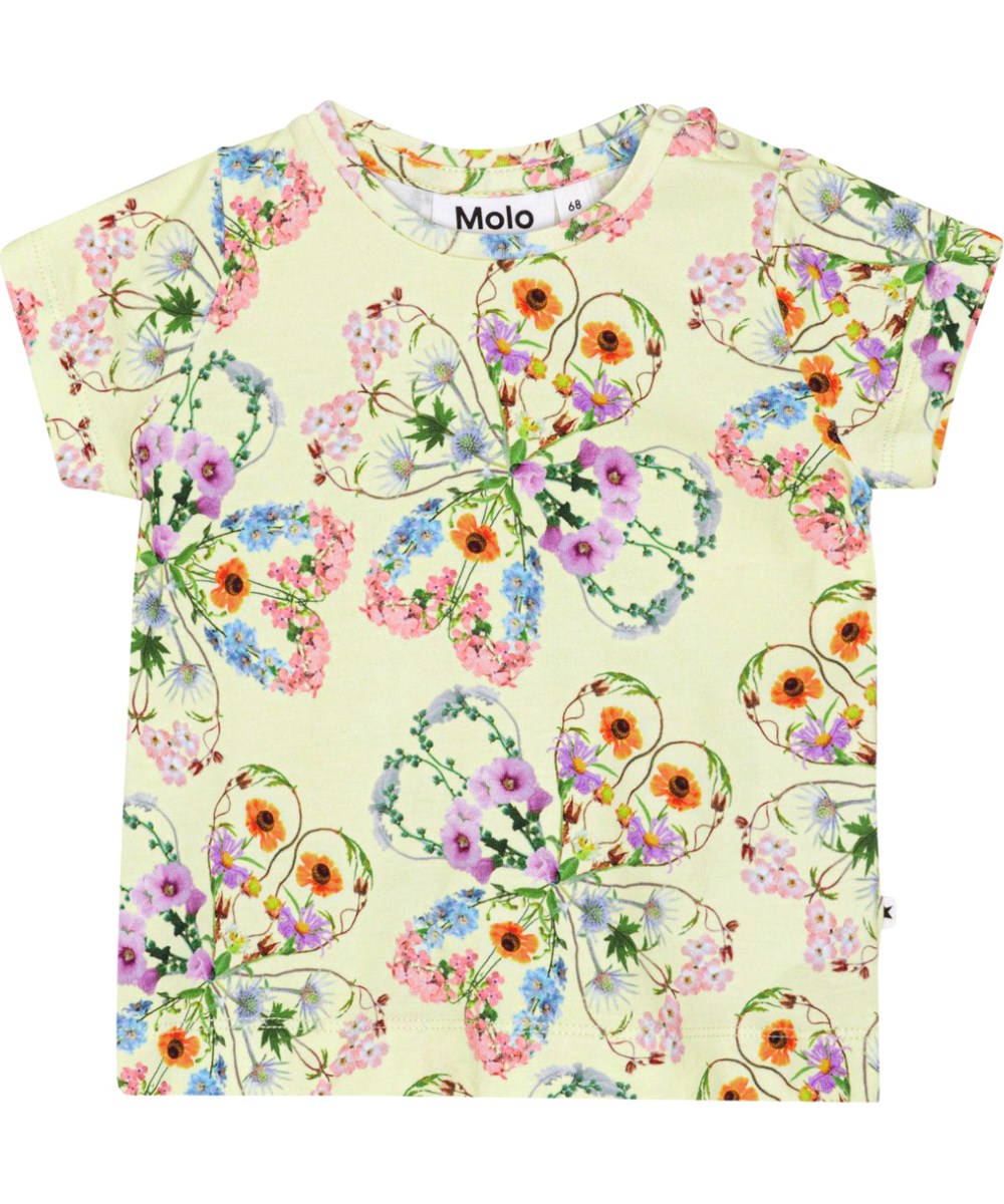 Elly - Flower Love - Gelbes T-Shirt aus weicher Öko-Baumwolle mit einem Allover-Print aus bunten Blumen, die wunderschöne Kleeblatt-Silhouetten bilden
