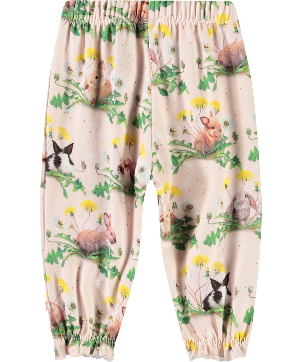 Selena - Bunnies United - Babybroek van biologisch katoen met een print van konijntjes en paardenbloemen.