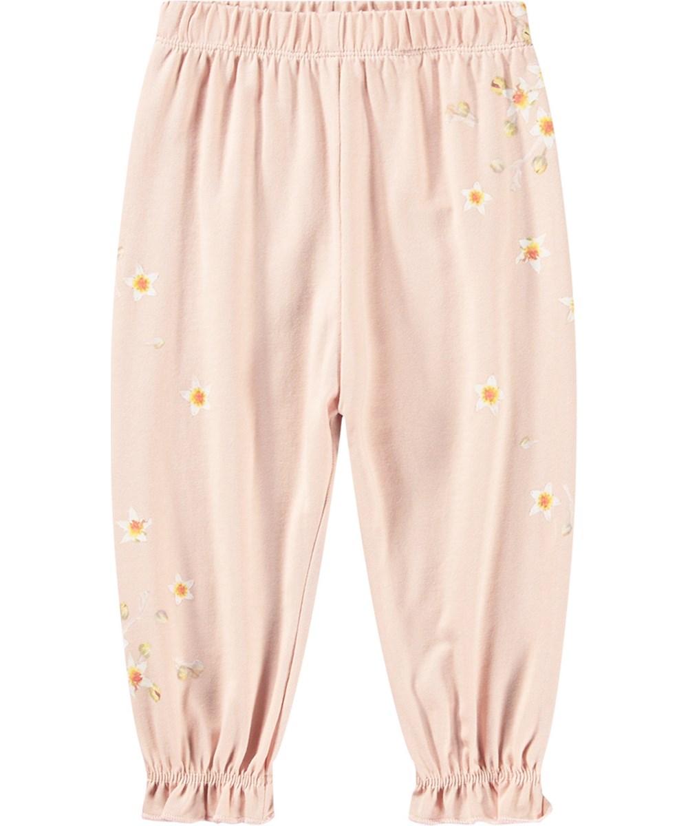 Selena - Little Flowers - Roze joggingbroek van biologisch katoen met een print van witte bloemen.