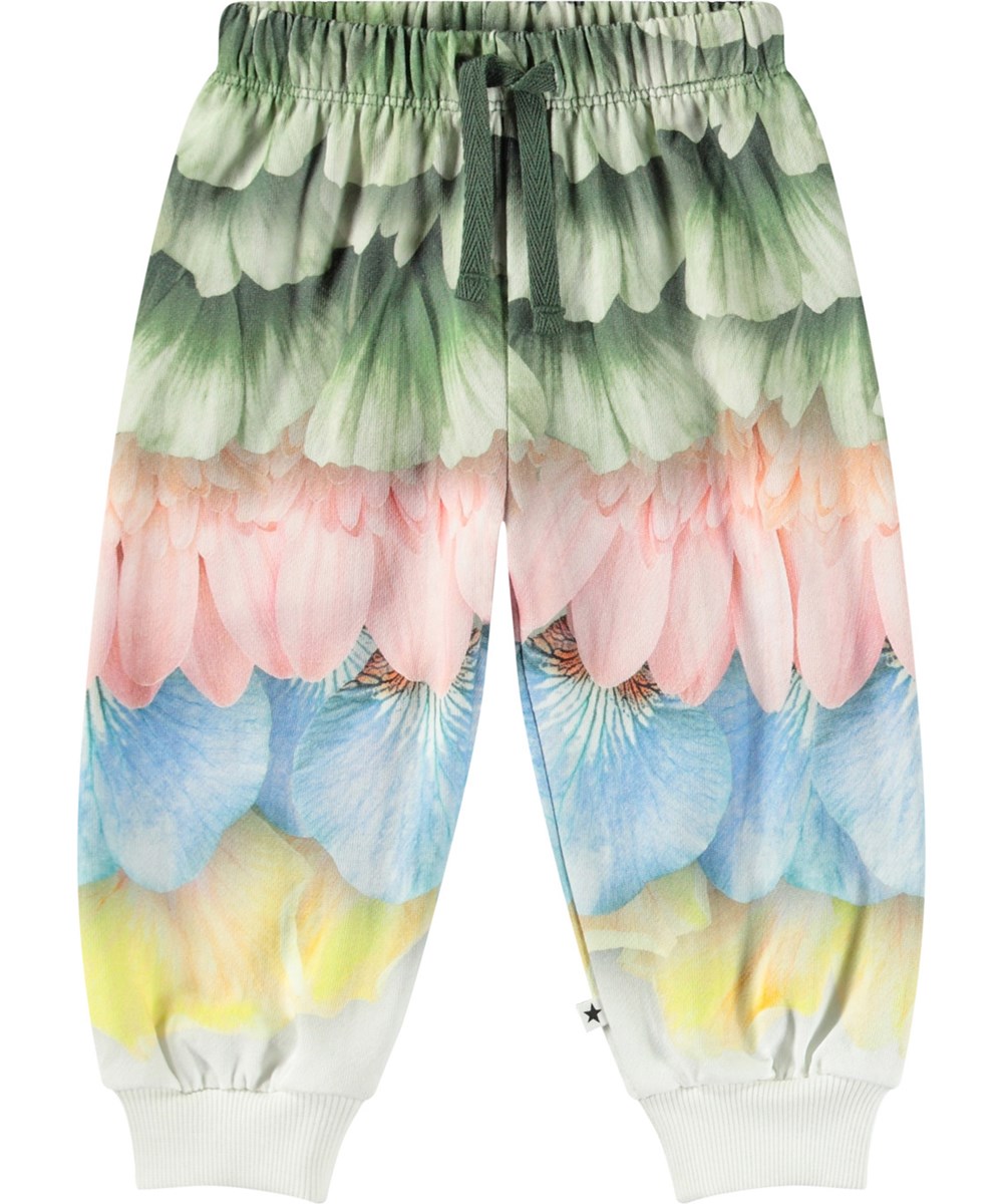Simeon - Petal Rainbow - Kleurrijke joggingbroek voor baby's van zacht biologisch katoen met een print van bloemblaadjes en veren.