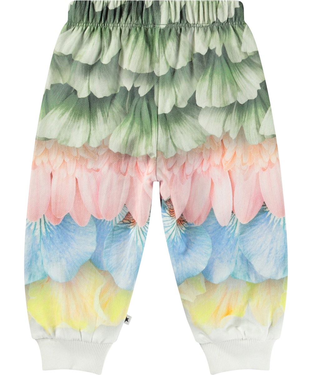 Simeon - Petal Rainbow - Kleurrijke joggingbroek voor baby's van zacht biologisch katoen met een print van bloemblaadjes en veren.