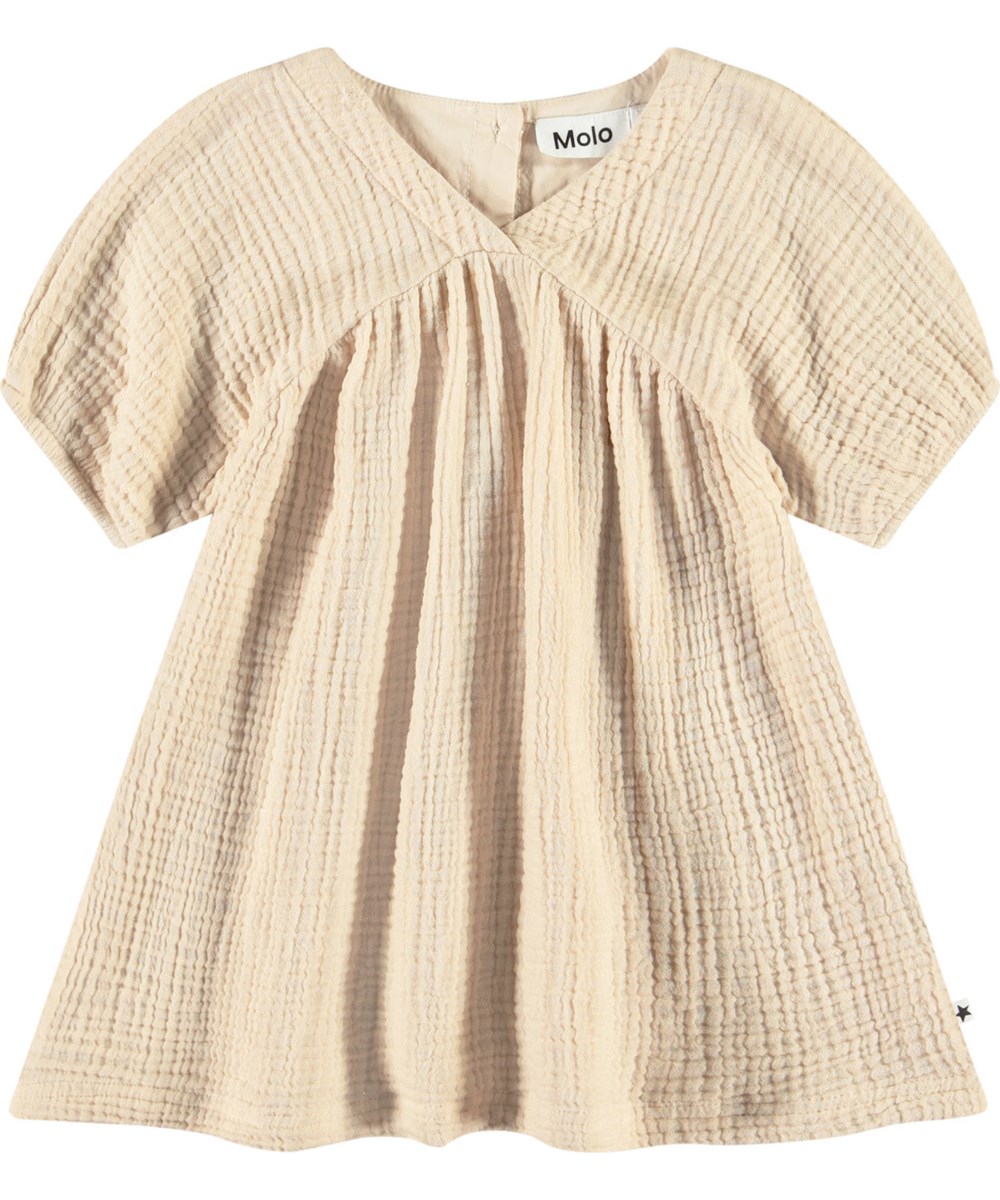 Calee - Brazilian Sand - Beige biologisch katoenen crêpe babyjurk.
