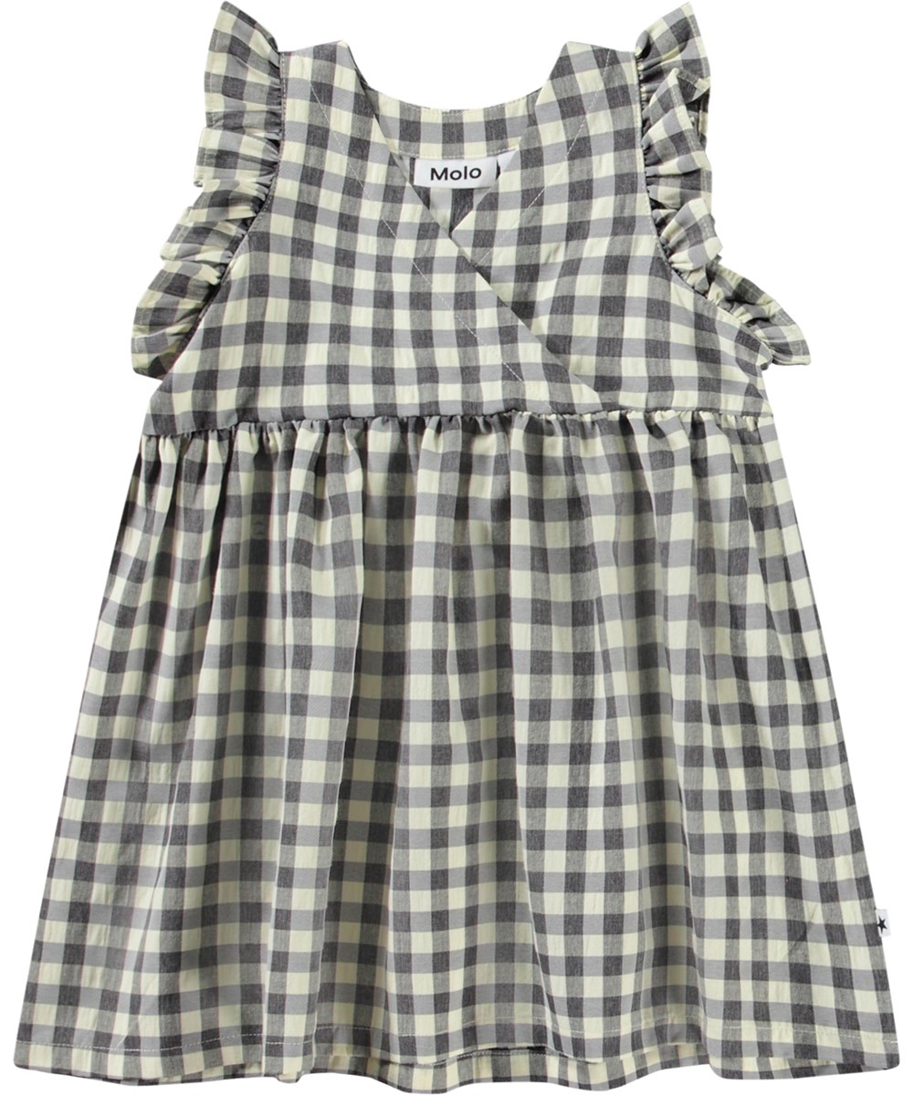 Callie - Sun Check - Zwart wit geblokte babyjurk van biologisch katoen met schattige details.