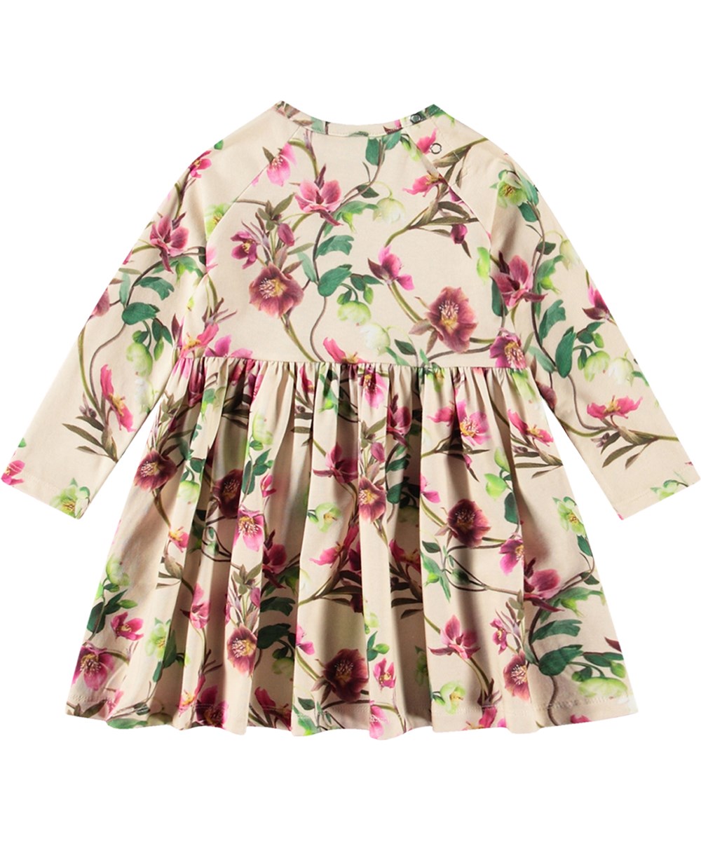 Charmaine - Hellebore - Beige jersey jurk van biologisch katoen met bloemenprint.