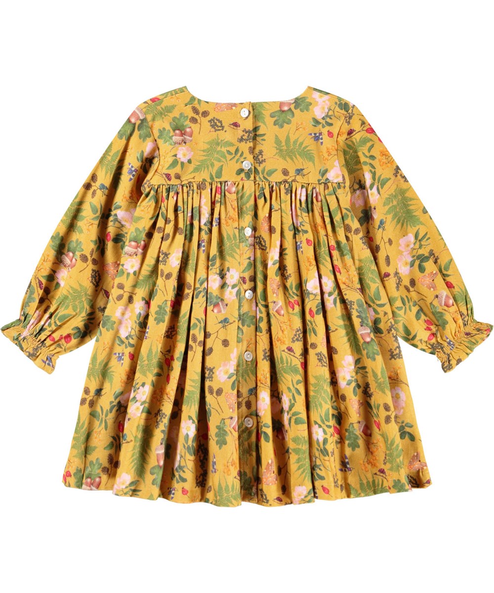 Claire - Foraging - Mooi gele jurk voor de kleintjes gemaakt van viscose met een print van bloemen, bessen en insecten.