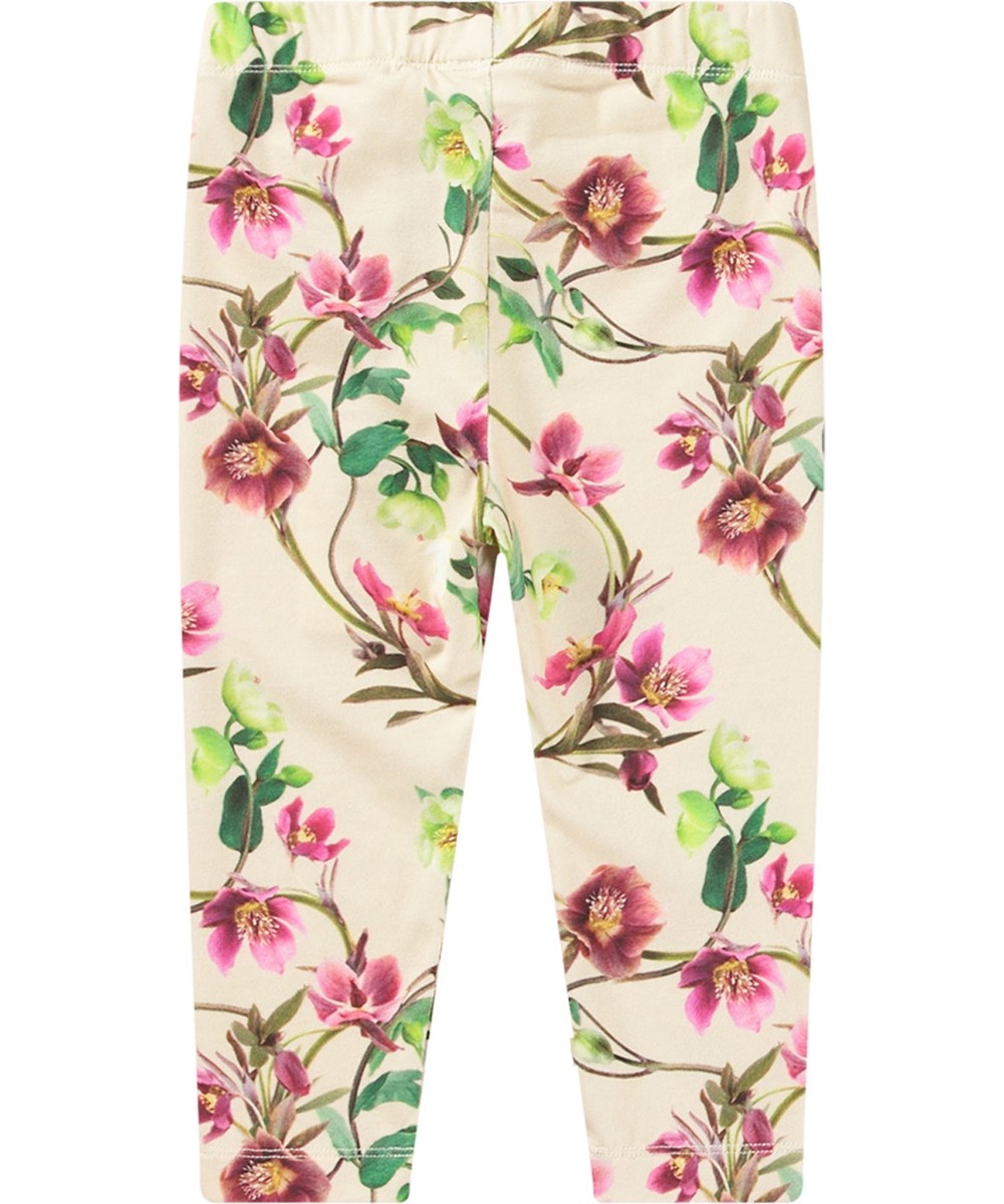 Stefanie - Hellebore - Gebroken witte biologische legging met een all-over bloemenprint.