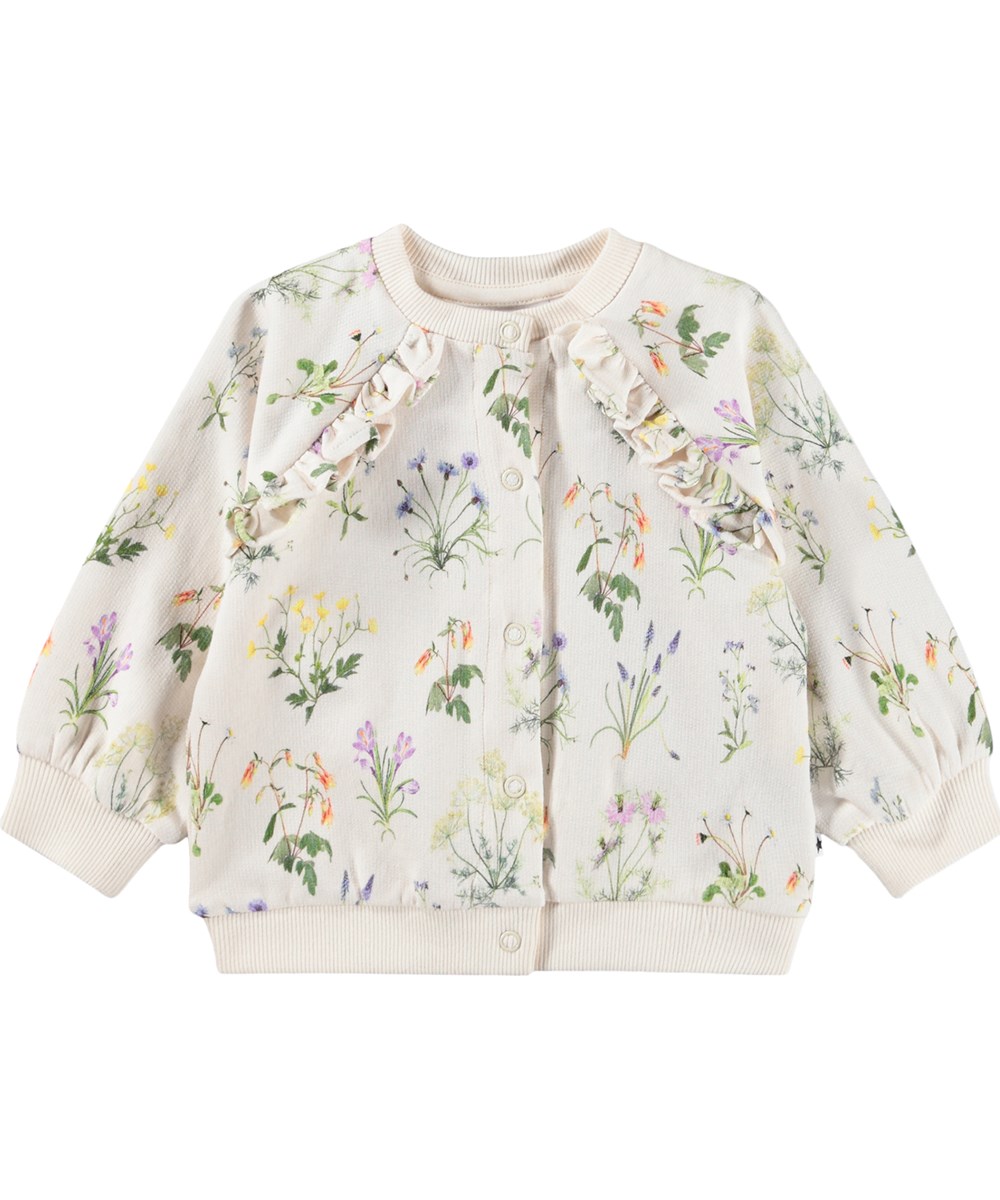 Daphne - Primavera - Wit vestje voor de kleintjes gemaakt van biologisch katoen met een bloemenprint en ruches.