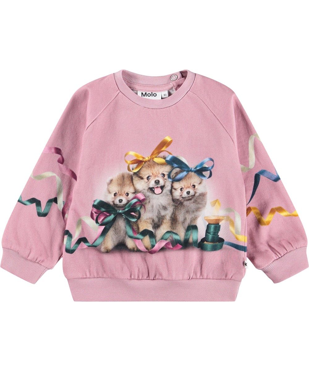 Disc - Ribbon Play - Biologische donkerroze baby sweater met een print van dieren met strikjes erop.