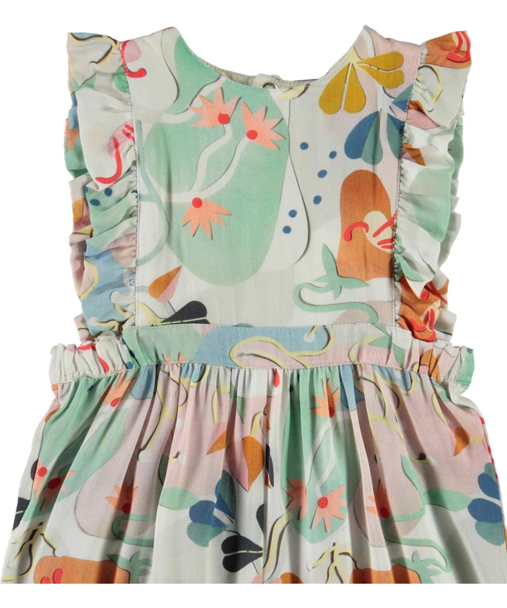 Fabia - Papercut Flowers - Pastelfarvet baby dragt med print