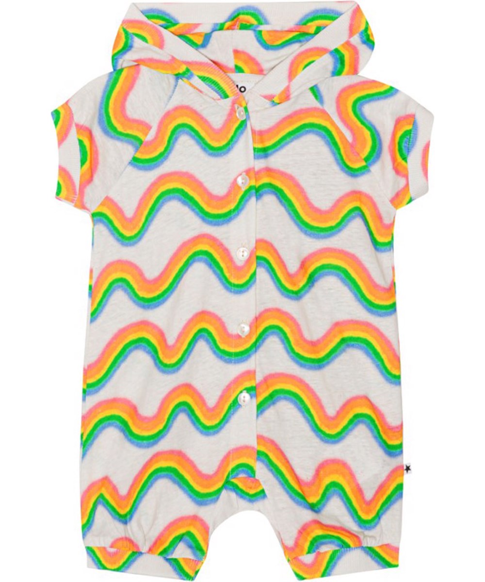 Fidelia - Rainbow Mini - Hvid heldragt med hætte i blødt økologisk bomuld med et farverigt alloverprint af Molos ikoniske regnbue